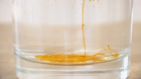 Dropping chemical liquid in test tubes. Close up of working with chemical reagen Stock Footage 96196809