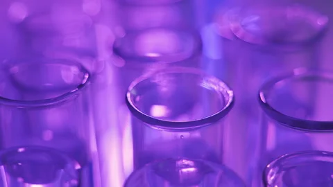 Dropping chemical liquid to test tubes for lab testing, science laboratory Video stock 110723479