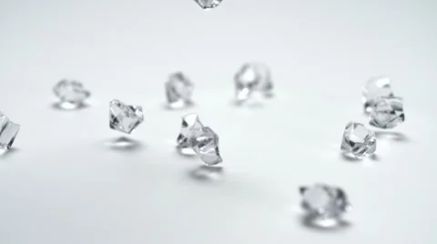 Dropping clear acrylic stone, Slow Motion Stock Footage 21931441