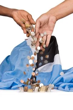 Dropping coins Stock Photos