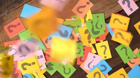 dropping colorful paper note with QUESTI... | Stock Video | Pond5