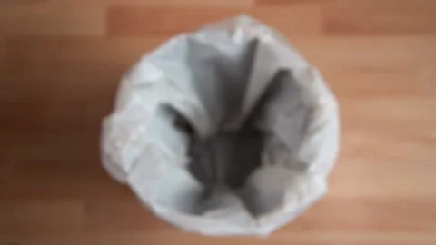 Dropping Disposable Mask Into White Bin Stock Footage 157173878