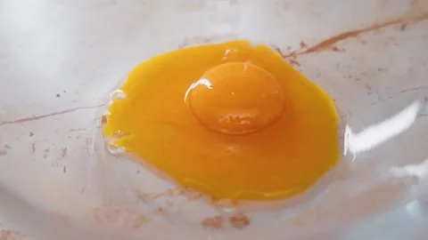 Dropping Egg Yolks In A Bowl. The Process Of Making Tasty Tiramisu Dessert. Stock Footage 237972516