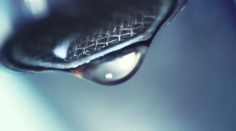 Dropping faucet close-up slowmotion Stock Footage 24723633