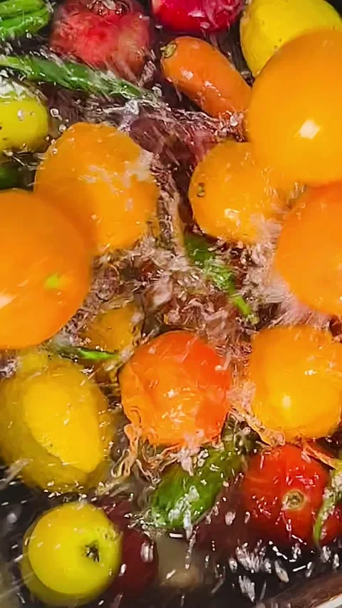 Dropping Fresh Orange into Water Close-up Slow Motion 9:16 Stock Footage 338205528