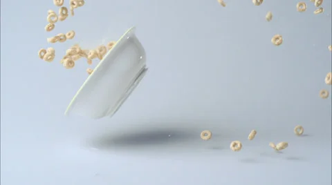 Dropping a full of cereal bowl, Slow Motion Stock Footage 31819470