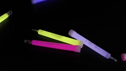 Dropping Glow Sticks in Darkness 库存影片 295600636