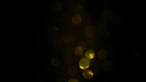 Dropping gold powder into the water Stock Footage 102293545