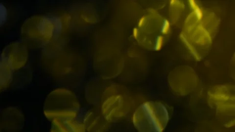 Dropping gold powder into the water Stock Footage 102411325