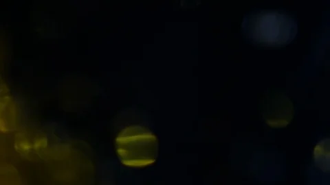 Dropping gold powder into the water Stock Footage 102414817