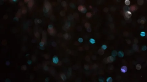 Dropping gold powder into the water Stock Footage 102469061