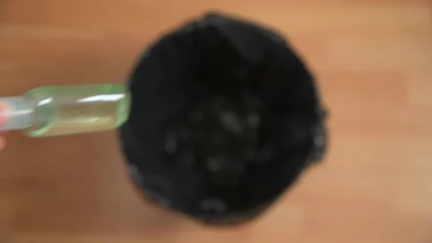 Dropping Hand Sanitiser Into Bin Stock Footage 157173612