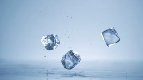 Dropping ice cubes, Slow Motion Stock Footage