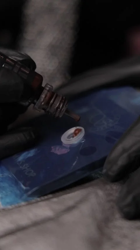 Dropping Ink for a Tattoo Machine Stock Footage 300481088