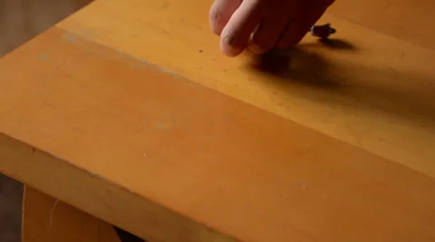 Dropping keys on vintage table Stock Footage 37798362