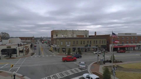 Dropping Left-Intersection-Historical Business District Stock Footage 97834561