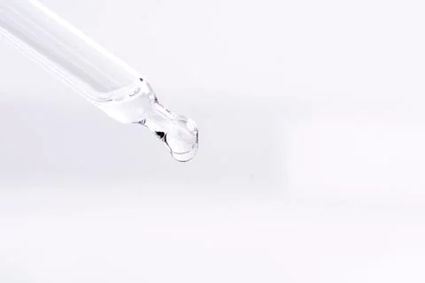 Dropping a liquid from a pipette Foto stock