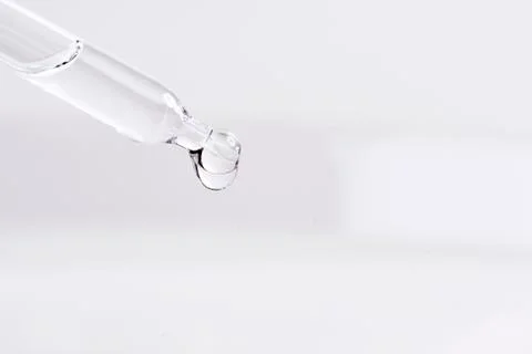 Dropping a liquid from a pipette Foto stock