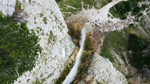 Dropping, lowering, Rotating View of Amazing Rinka Waterfall Slide. Stock Footage 168140118
