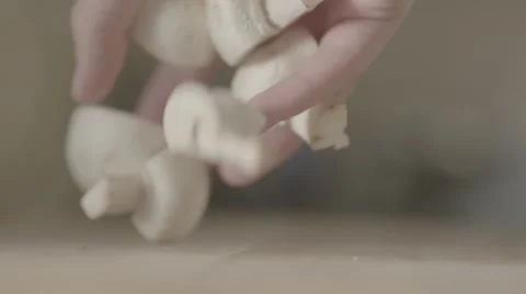 Dropping mushrooms, slow motion Stock Footage 56776054