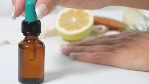 Dropping oil close up zoom Stock Footage 117428401