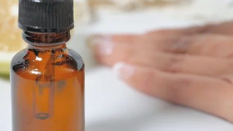 Dropping oil extreme closeup Stock Footage 117428642