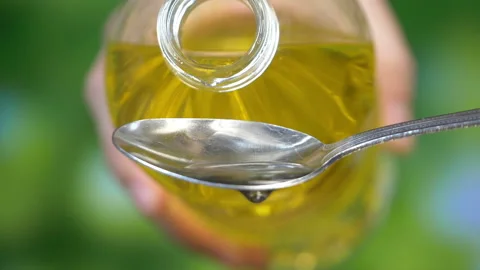 Dropping olive oil in Slow motion Stock Footage 88113253