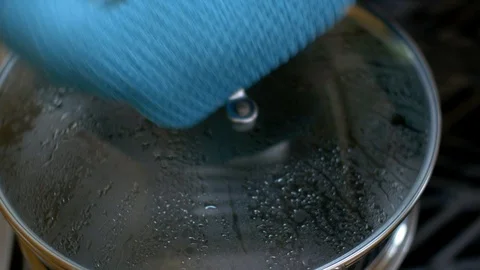 Dropping pasta into boiling water Stock Footage 117541361