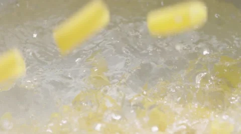 Dropping pasta in hot water Stock Footage 61827752