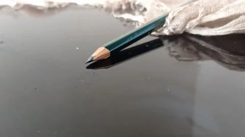 Dropping the pencil on a paper test Stock Footage 146252194