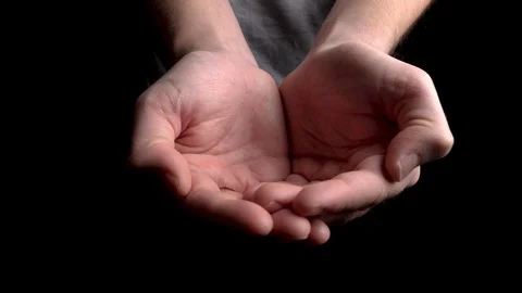 Dropping penny dimes on a open donation hand Stock Footage 127586396