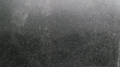 Dropping powder into the water Stock Footage 101566746