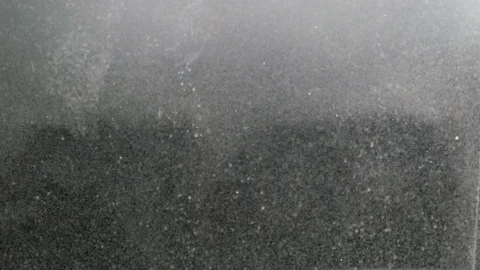 Dropping powder into the water Stock Footage 101569343