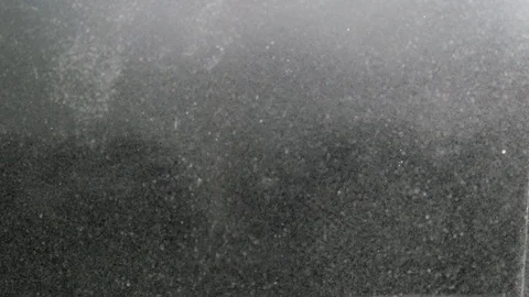 Dropping powder into the water Stock Footage 101569538