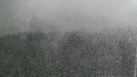 Dropping powder into the water Stock Footage 101718816