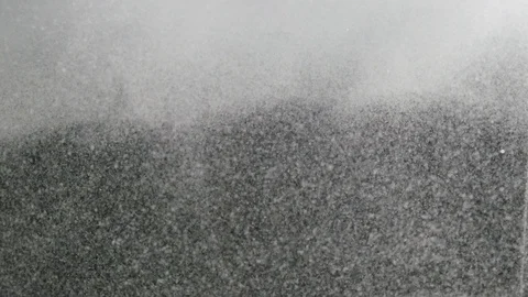 Dropping powder into the water Stock Footage 101718824