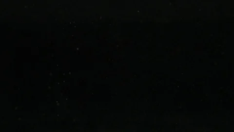 Dropping powder into the water Stock Footage 122103535