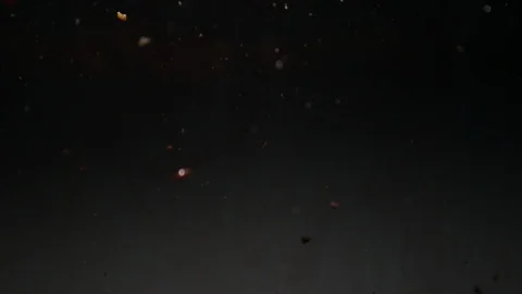 Dropping red ingredient into the water background Stock Footage 102615570