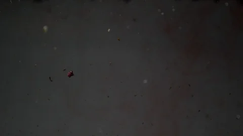 Dropping red ingredient into the water background Stock Footage 102653292