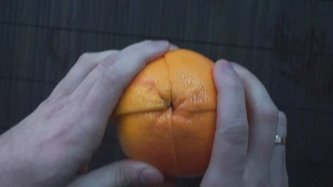 Dropping the sliced grapefruit in slow motion Stock Footage 86682839