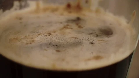 Dropping sugar in a coffee in slow motion Stock Footage 76249637