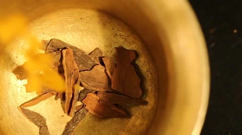 Dropping Turmeric into a Spice Grinder Stock Footage 49500810