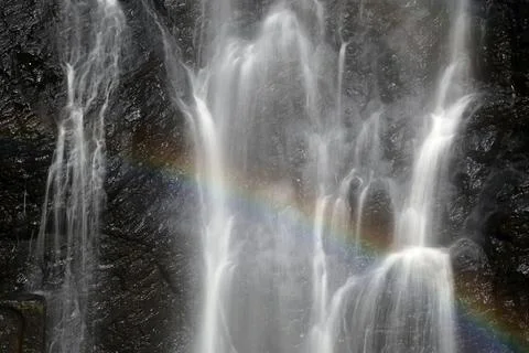 Drops and splashes waterfall closeup background Stock Photos