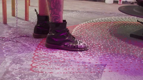 Drops are falling down on the boots Stock Footage 155243028