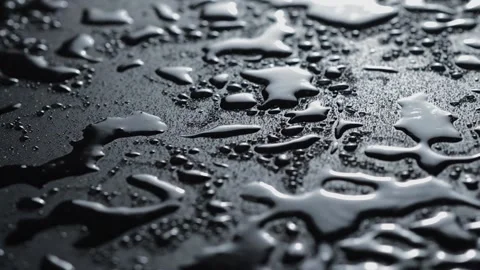 Drops on black Stock Footage 154427441