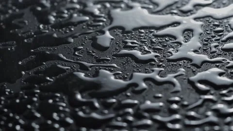 Drops on black Video stock 154427447