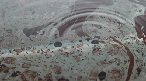 Drops of black oil paint falling in water Stock Footage 46632607