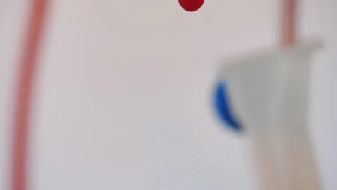 Drops of blood fall down. Allegory of flowing blood. Stock Footage 130486199