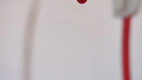 Drops of blood fall down. Allegory of flowing blood. Stock Footage 130486244