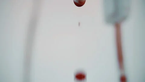 Drops of blood fall down. Allegory of flowing blood. Stock Footage 130486313